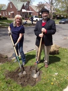 Robert E. Buxbaum and friend planting trees in Detroit. Arbor day, 2012.