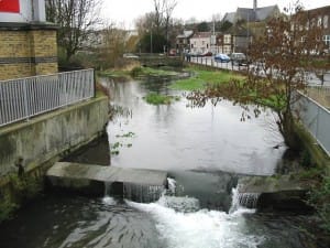 Weir dam on the river dour. Used to manage floods, increase residence time, and oxygenate the flow.